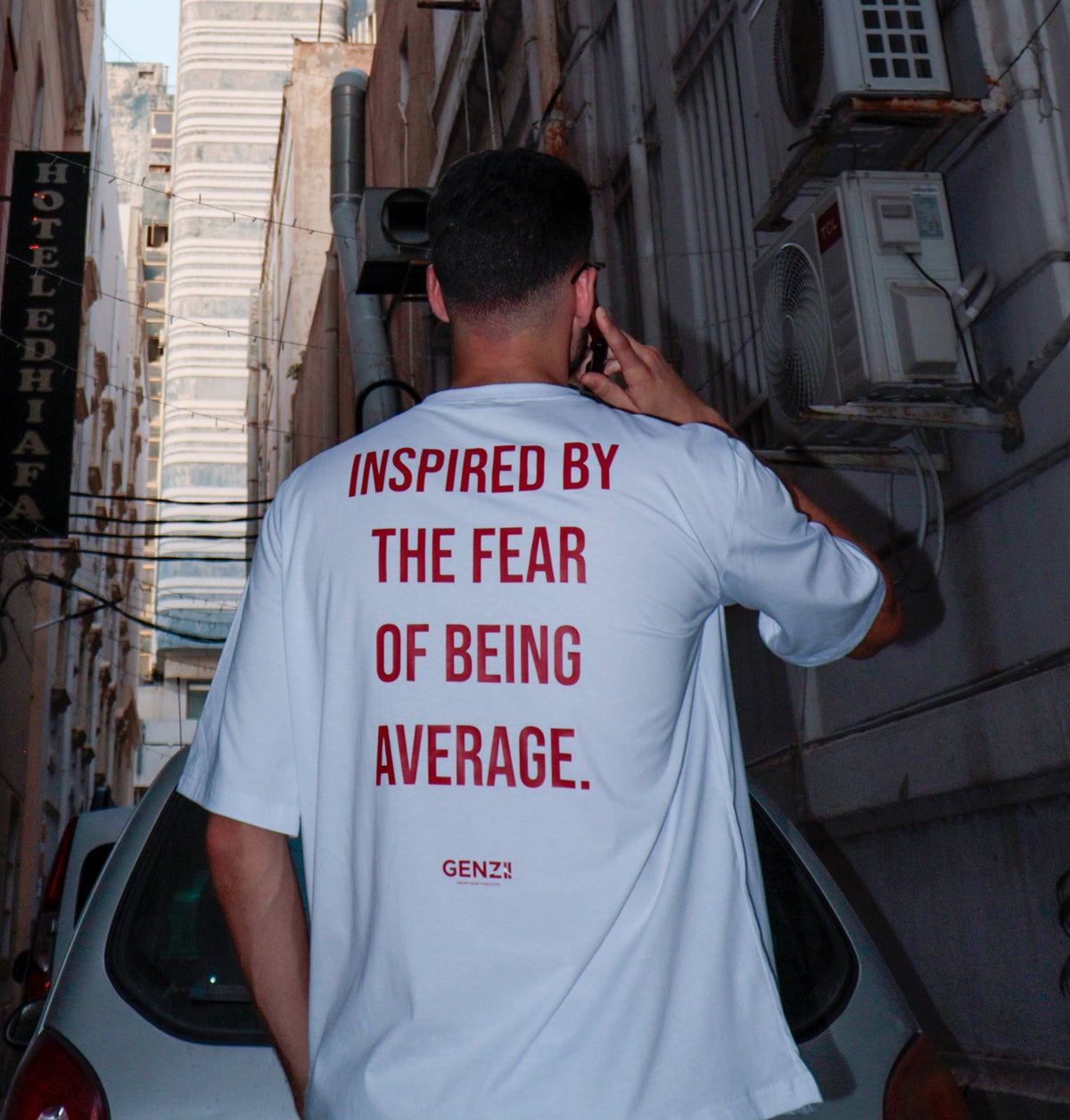 Inspired By The Fear Of Being Average – Oversized White T-Shirt